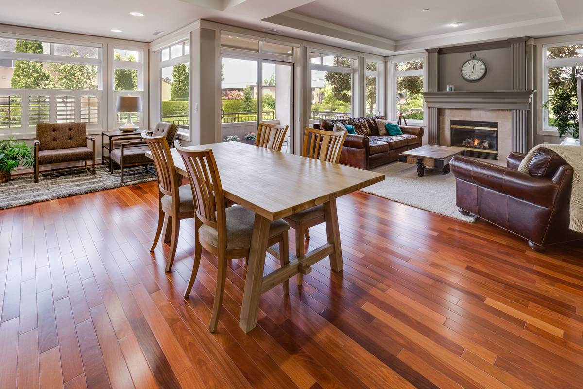 Before: standard wood table. After: Senwood Aura Table with glowing charging zone and air quality indicator