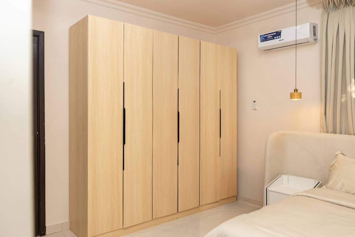 trendy smart wardrobe with LED lighting, touchscreen mirror, and automated clothing rack