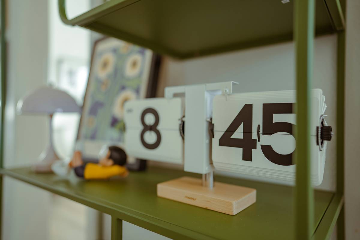 Modern wooden cloud connected shelf with ambient LED lighting and smartphone showing companion app interface